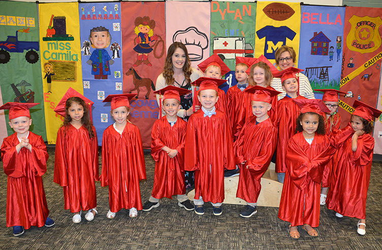 Preschool students graduate